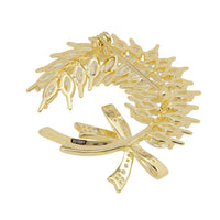 Gold-toned laurel and ribbon brooch with openwork design and crystal-like details