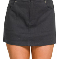 Black cotton twill lined mini skirt with button front and side pockets