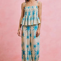 Blue palm tree smocked bodice adjustable cami top with tiered ruffle hem
