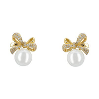 Gold ribbon bow pearl stud earrings with rhinestone accents