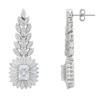 Silver-tone drop earrings shown front and side, with marquise clusters and round charm