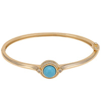 Gold cuff bangle with turquoise oval and round pave detail