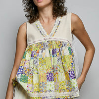 Sheer V-neck lace-trim tank with colorful floral peplum-style hem