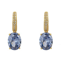 Gold oval drop earrings with tanzanite stones and pavé-set hoops