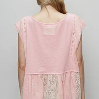 Blush pink lace peplum blouse with embroidered back yoke, cap sleeves—back view