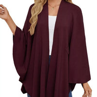 Burgundy cape shawl with open front, long draped sleeves, and front tie knot