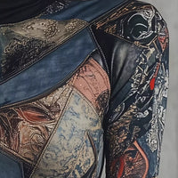 Patchwork printed mock neck T-shirt, close-up of long-sleeve patchwork graphics