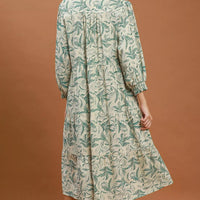 Green linen botanical print tiered midi dress with tiered back and long sleeves