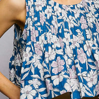 Navy floral pintuck sleeveless cropped tank top, close-up of pleated texture