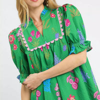 Green floral V-neck dress with ruffled collar and puff sleeves