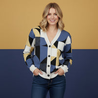 Woman wearing a geometric patterned cardigan against a two-tone background