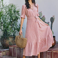 Red-and-white striped wrap midi dress, V-neck and tied waist, short puff sleeves