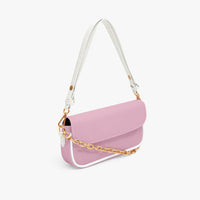 Pastel pink shoulder bag with front flap, gold chain strap, and white top handles