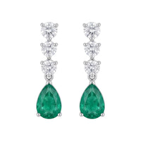 Silver triple-drop earrings with emerald-green pear stones and heart accents
