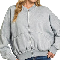 Acid-washed gray fleece full-zip jacket with elastic waist and ribbed cuffs