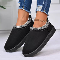 Black platform ankle boots, round toe, decorative patterned trim at the opening