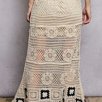 Natural crochet maxi skirt with ruffled waistband and black square trim at hem