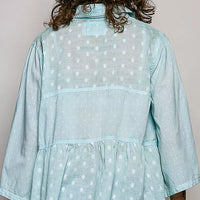 Aqua polka-dot button-front shirt with gathered waist and long sleeves, back view