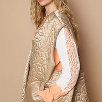 Quilted mocha front-zip vest with textured pattern and angled side pockets