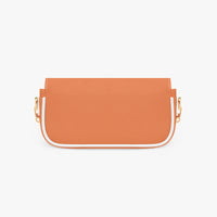 Orange compact shoulder bag with structured front, open top flap, and gold hardware
