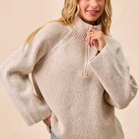 Two-tone rib knit half-zip sweater with raised collar, taupe and cream