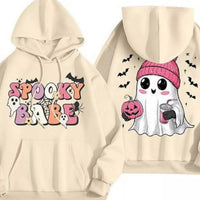 Plus-size Halloween graphic long-sleeve hoodie in pastel yellow with Spooky Baby front print