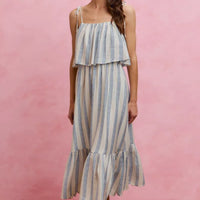 Blue and white striped midi dress with tiered skirt and tie shoulder straps