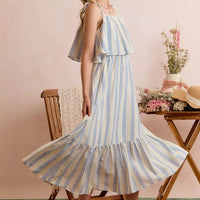 Blue and white striped tiered midi dress with ruffle shoulder detail and ties