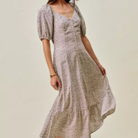 Ditsy floral midi dress angled view, square neckline, puff sleeves, elastic waist