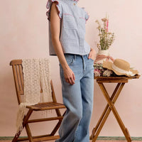 Blue-and-red striped twill vest top with ruffled sleeves and hidden button placket