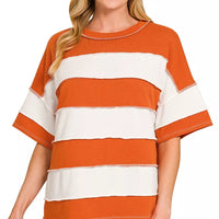 Burnt orange and white striped terry top with crew neck and contrast trim