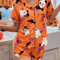Orange Halloween lounge set with button-down short-sleeve top and matching shorts