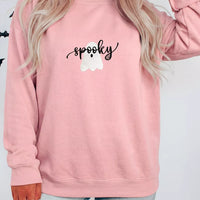 Dusty pink round-neck sweatshirt with spooky ghost graphic, long sleeves