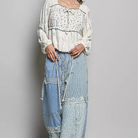 Cream lace square-neck top with long balloon sleeves, gathered waist and tiny floral print