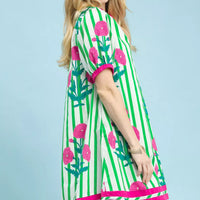 Green striped floral dress with pink trim and short sleeve cuffs, relaxed fit