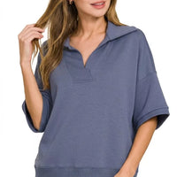 Blue indigo scuba collared short-sleeve pullover, V placket and dropped shoulder seams