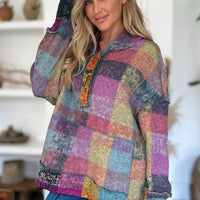 Multicolor plaid fleece hoodie with hood and quarter-zip placket, relaxed dropped shoulders