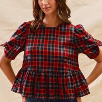 Red plaid peplum top with ribbon bow sleeve ties and short puff sleeves