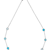 Silver chain necklace with evenly spaced round blue beads