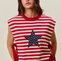 Red and ivory striped sleeveless vest top with large navy star patch and side ties