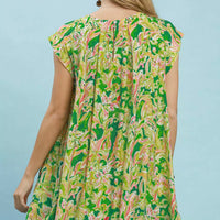 Green tropical floral swing dress, back view, flutter sleeves and round neckline