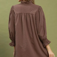 Chocolate textured mini dress with puff sleeves and pleated back yoke