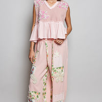 Powder pink floral patch ruffled sleeveless top with tiered peplum and V-neck