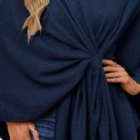 Navy cape shawl front tie knot detail with draped folds