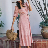 Red striped wrap midi dress with puff sleeves and sash tie; tiered midi length