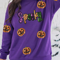 Violet sequin Halloween sweatshirt with 'Spooky' lettering and pumpkin sequins