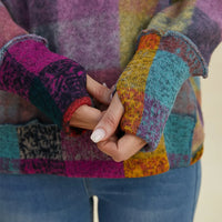 Multicolor plaid fleece hoodie with kangaroo pocket and knit cuff detail