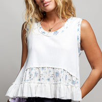 Off-white ribbed tank top with floral patch and double ruffle hem