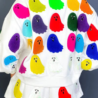 Back view of white ghost-print long sleeve top and shorts set, elastic waist