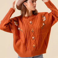 Brick embroidered flower cable-knit sweater with long sleeves and crew neckline